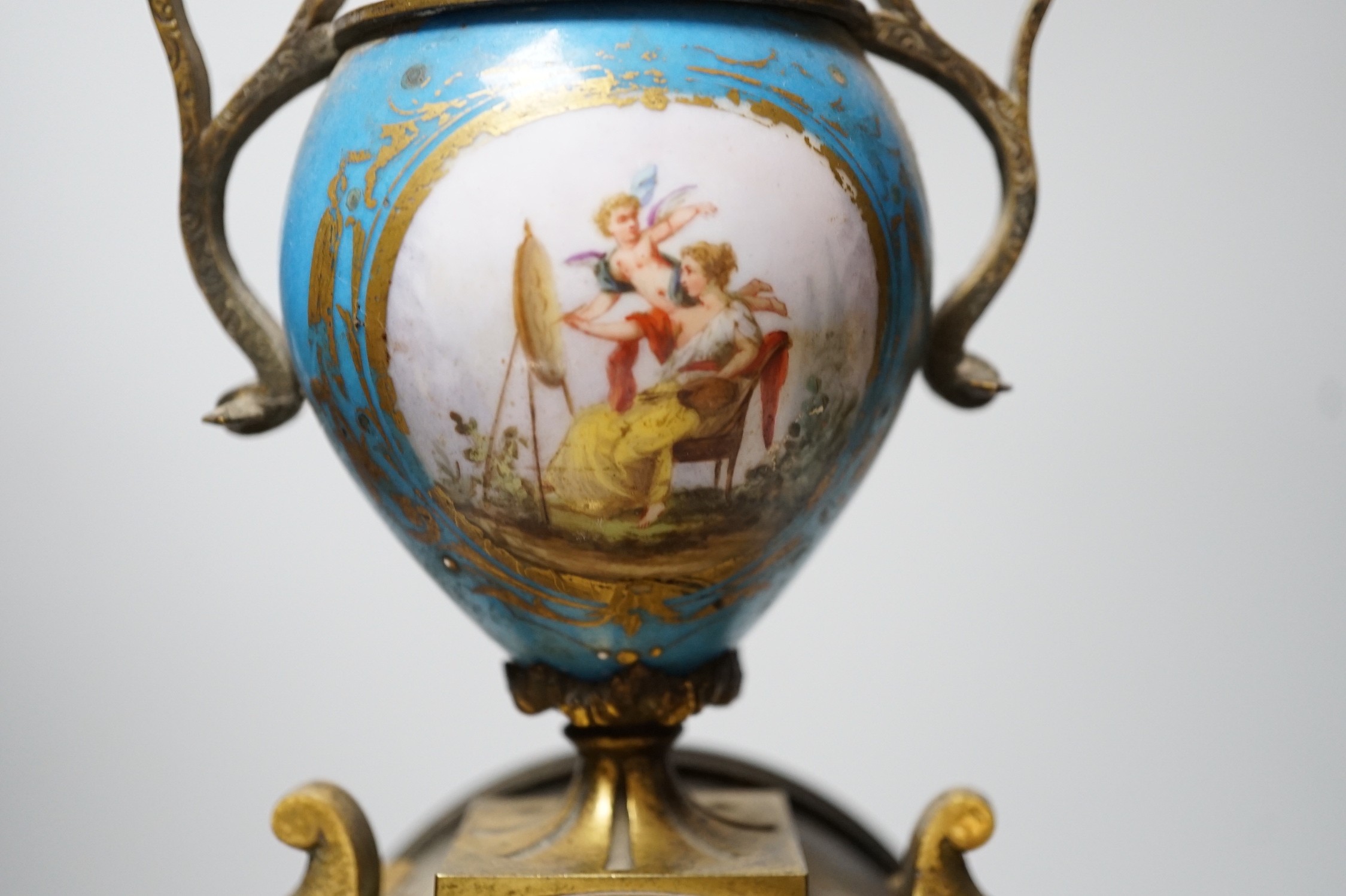A Sevres style porcelain mounted ormolu mantel clock, 36cms high